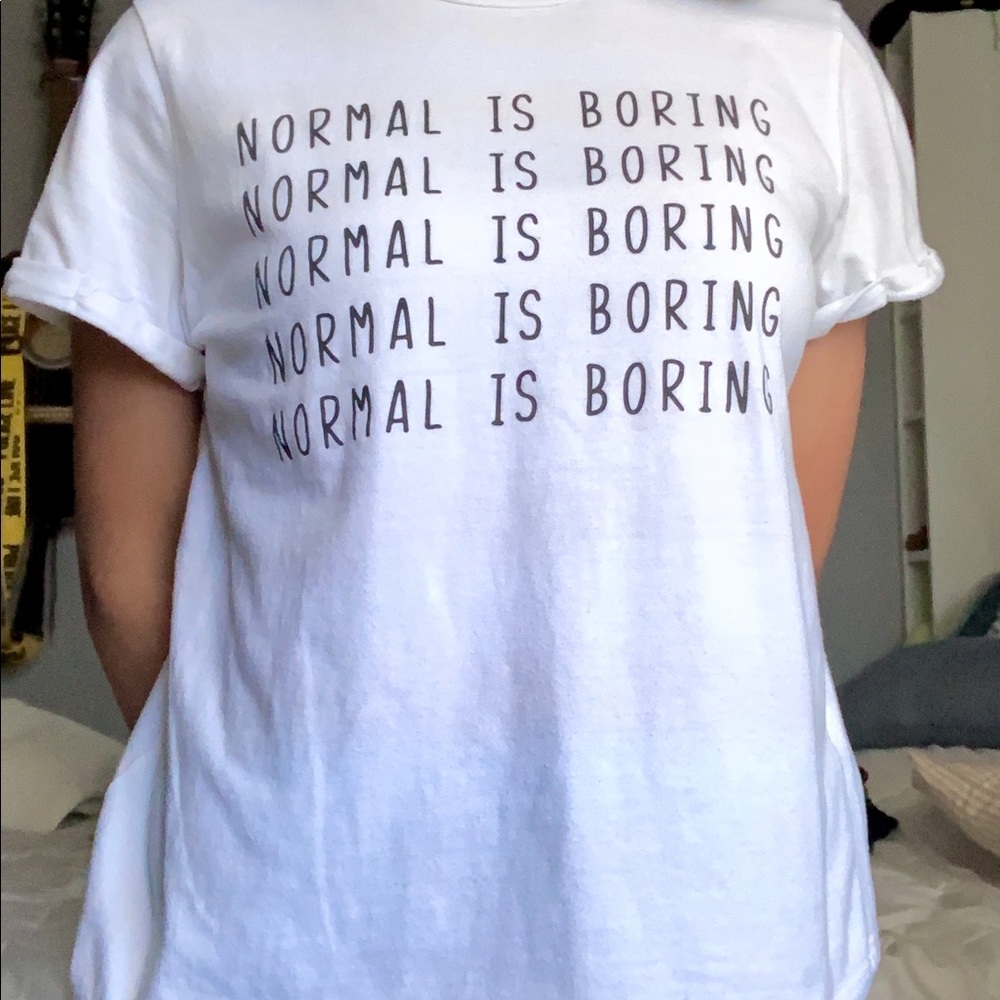“Normal is boring” slogan graphic tshirt